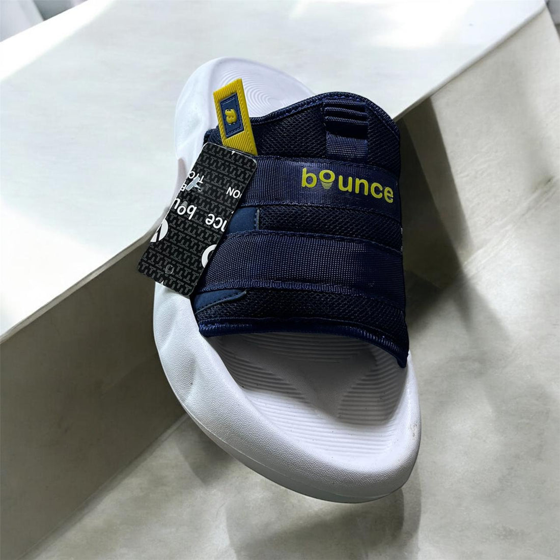 BOUNCE BLUE AND WHITE SLIPPER