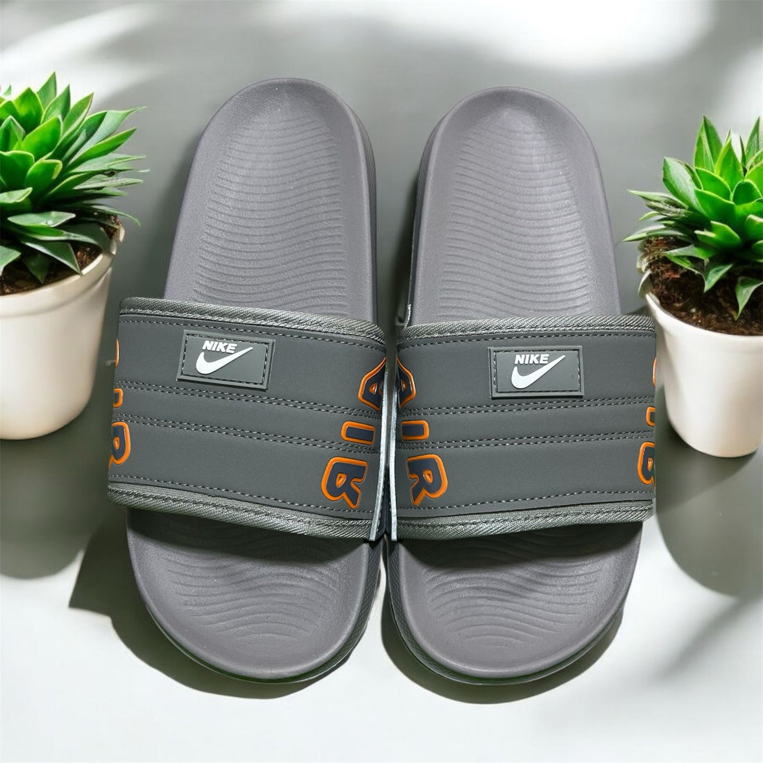 NIKE AIR SLIDS GREY